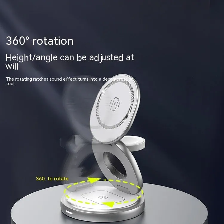 3-in-1 magnetic folding wireless charger stand in grey, with phone and headphones on a desk