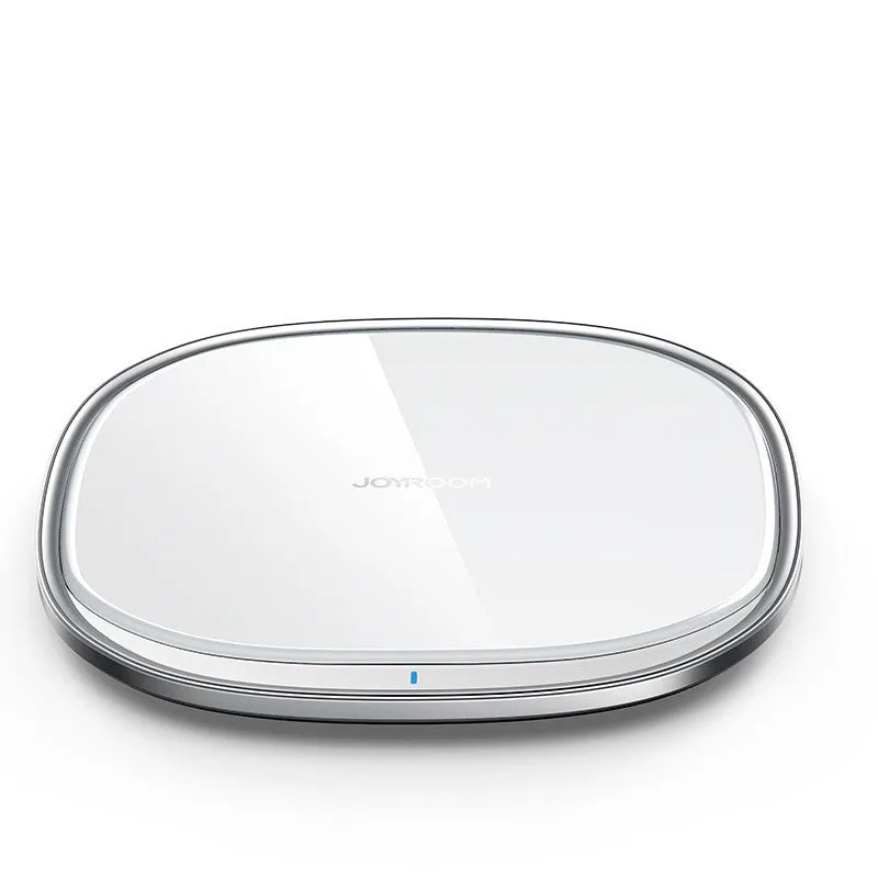 Square black 15W wireless charging pad with glass top and thin zinc alloy frame on a wooden desk