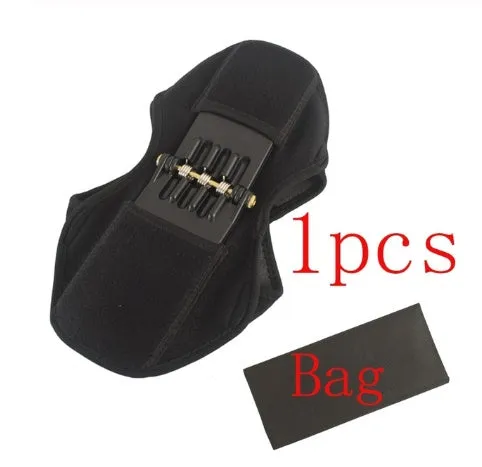 Black spring knee brace support with adjustable straps and visible venting holes, shown on a knee.