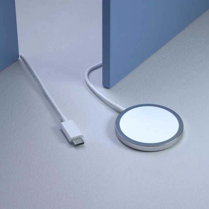 White 15W magnetic wireless charger for MagSafe iPhones on desk with 1m cable