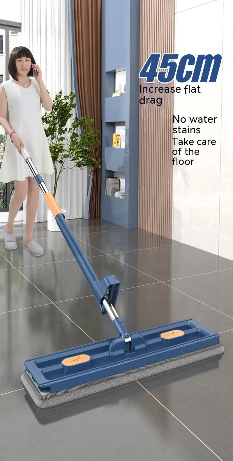 Large blue flat mop with a long silver handle showing the rotating head and built-in dewatering scraper.