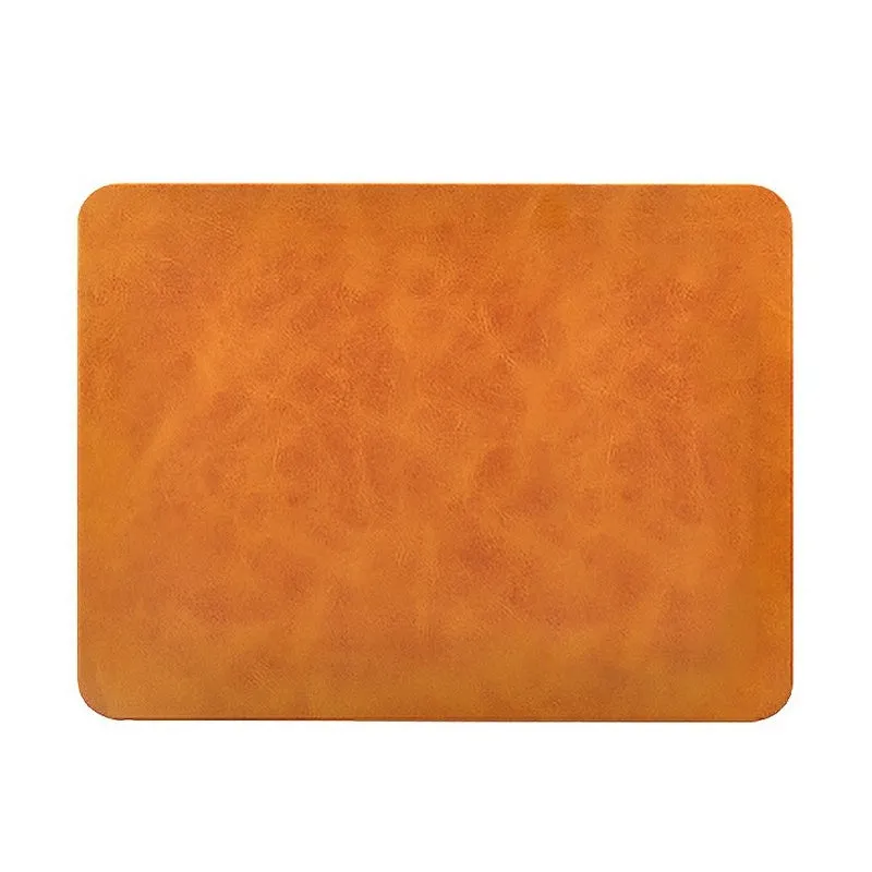 Brown leather and PU wireless charging mouse pad with Micro USB port for fast smartphone charging.