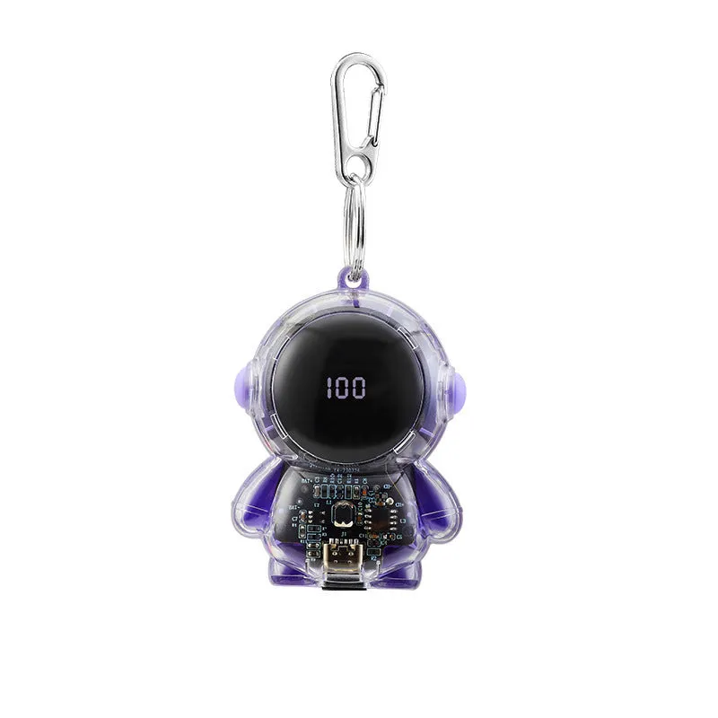 Small keychain emergency power bank in orange plastic shell with cartoon-style design and keyring attachment