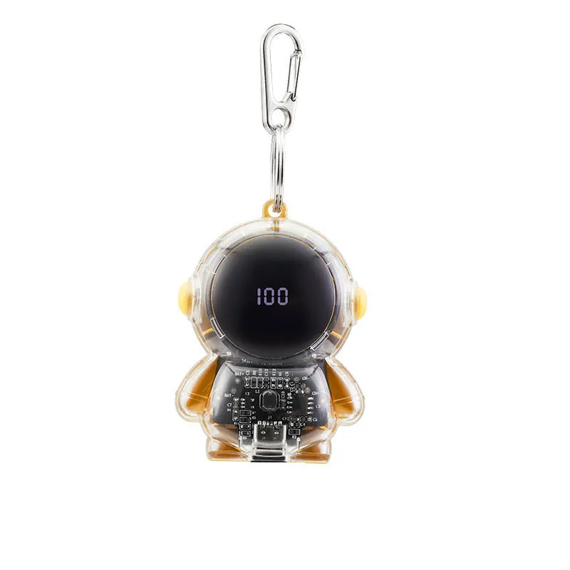 Small keychain emergency power bank in orange plastic shell with cartoon-style design and keyring attachment