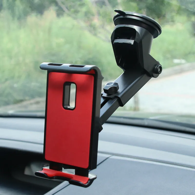 Black universal tablet PC car stand bracket clamped to dashboard centre console holding a tablet