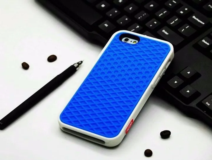 Waffle sole silicone phone case for iPhone 6s with checker pattern texture in black edge on brown background