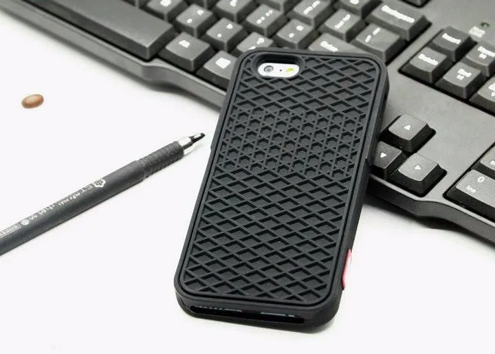 Waffle sole silicone phone case for iPhone 6s with checker pattern texture in black edge on brown background