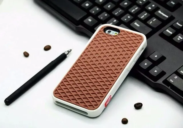 Waffle sole silicone phone case for iPhone 6s with checker pattern texture in black edge on brown background