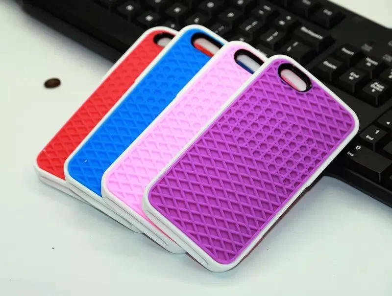 Waffle sole silicone phone case for iPhone 6s with checker pattern texture in black edge on brown background