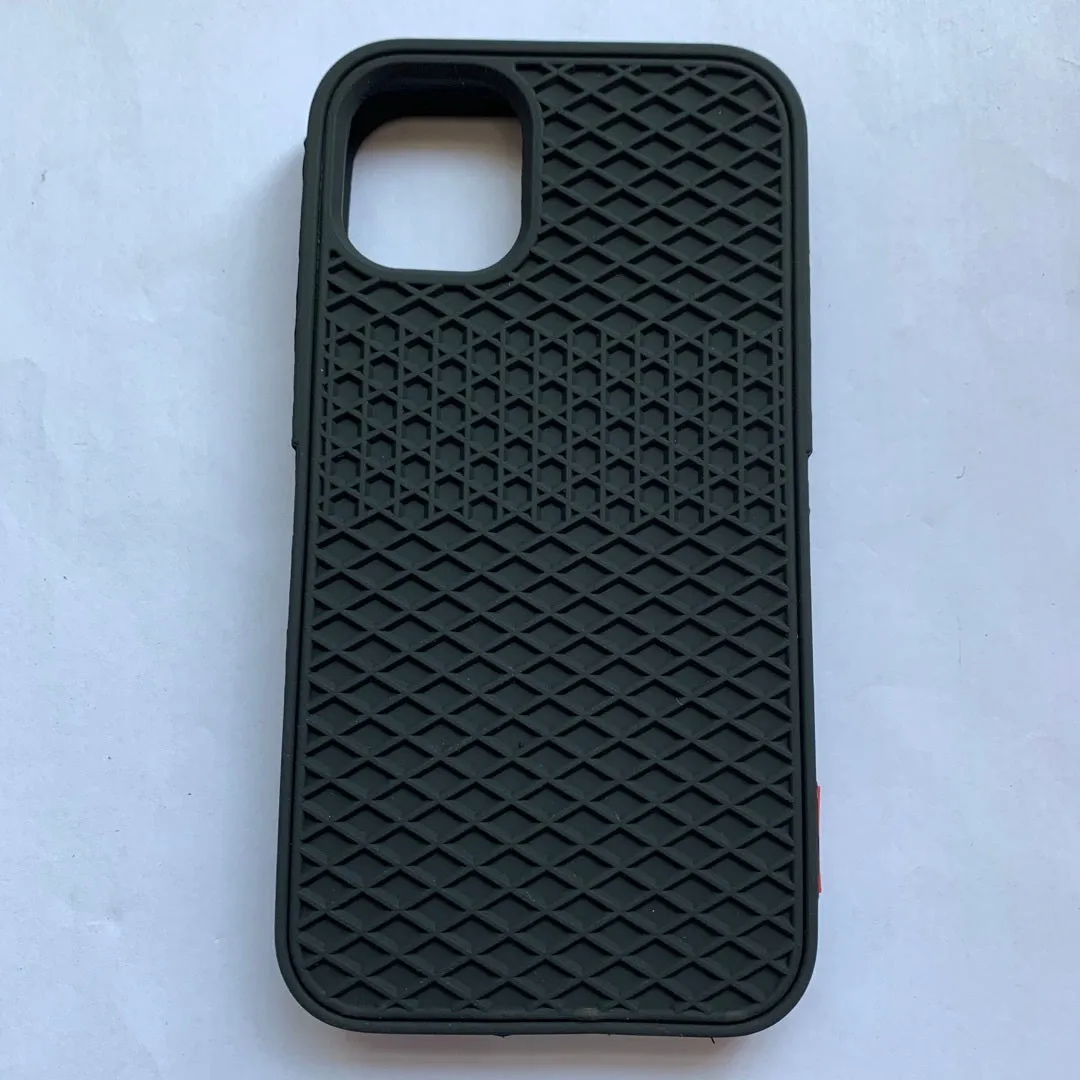 Waffle sole silicone phone case for iPhone 6s with checker pattern texture in black edge on brown background