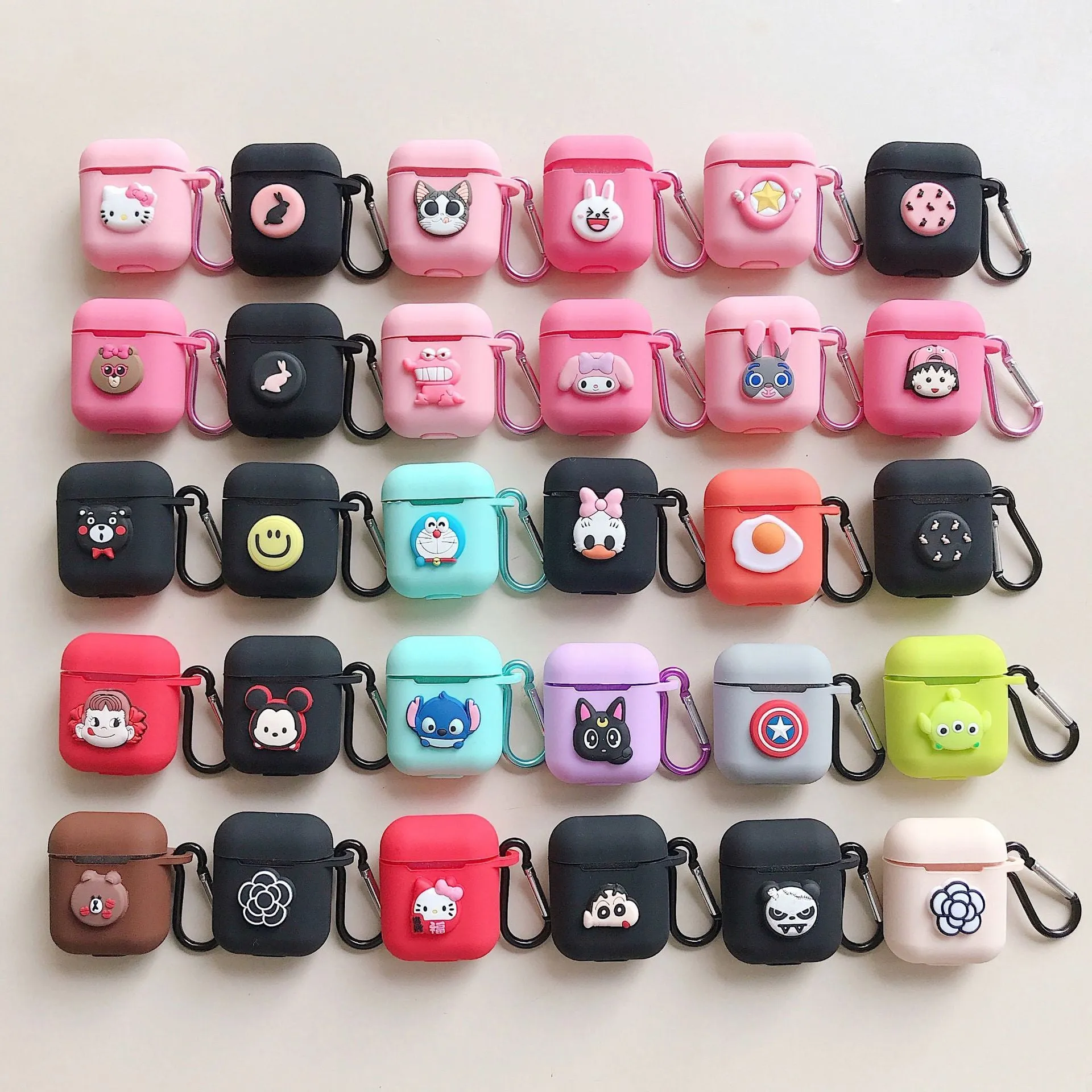 Silicone protective case for Bluetooth earphones with cartoon design and key-clasp hanging rope