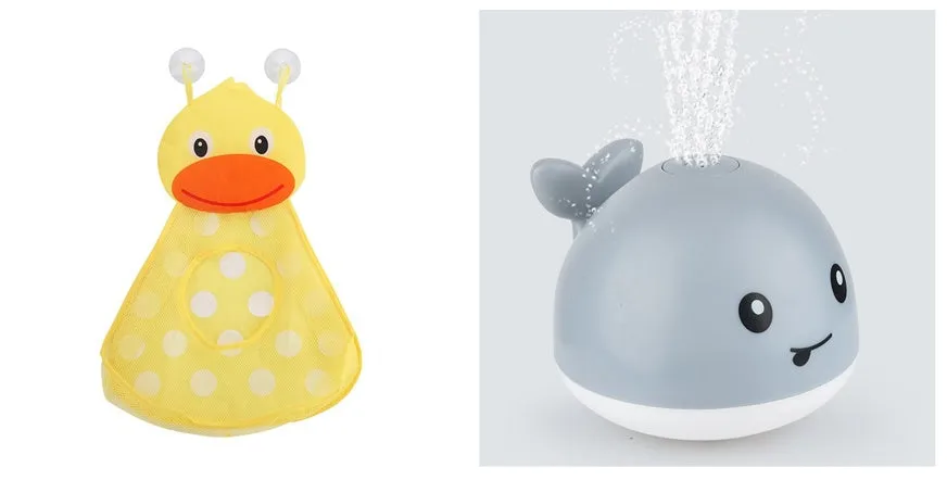 White and blue whale bath toy spraying water with LED lights on, floating in a bathtub