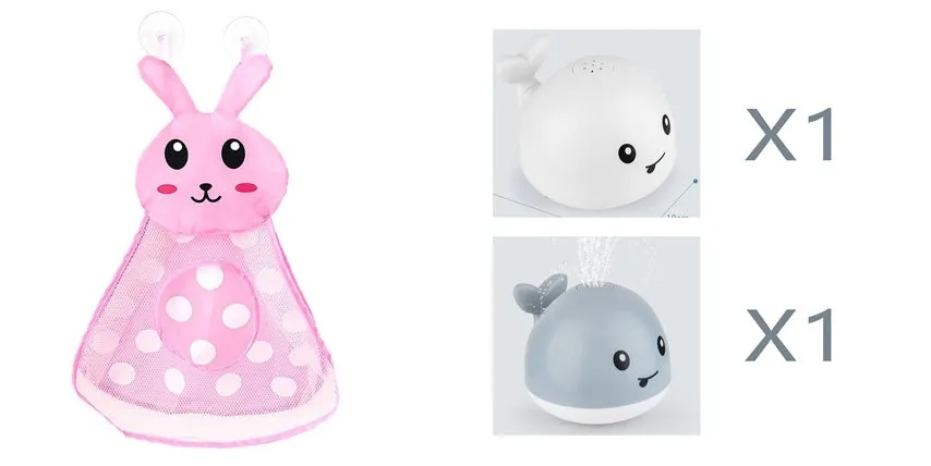 White and blue whale bath toy spraying water with LED lights on, floating in a bathtub