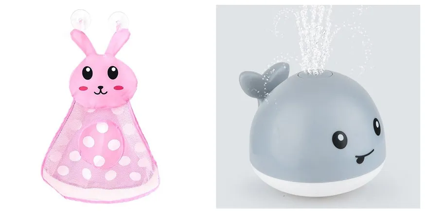 White and blue whale bath toy spraying water with LED lights on, floating in a bathtub
