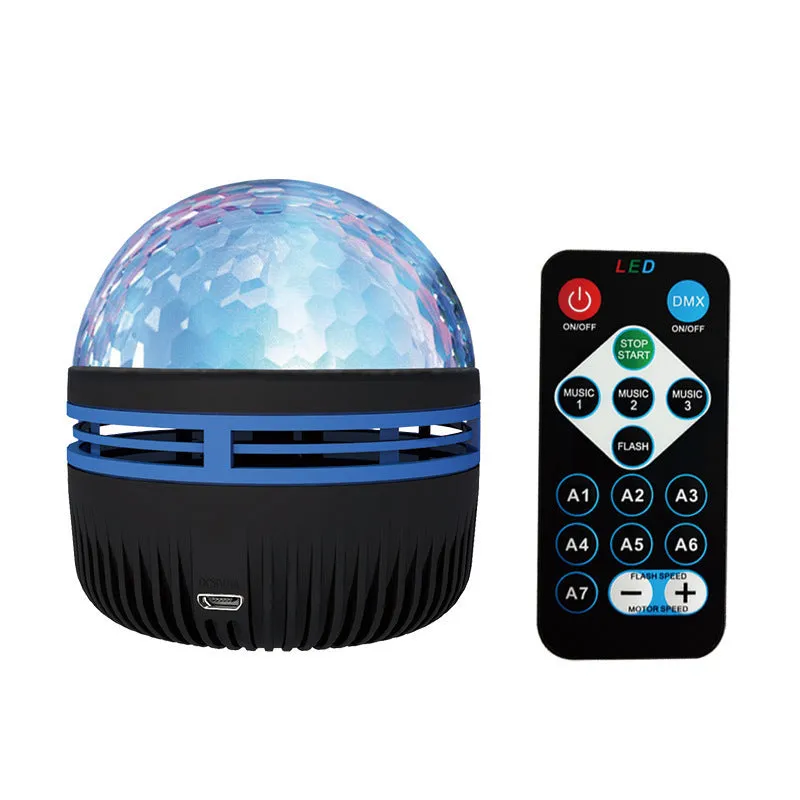 LED star galaxy projector lamp with removable acrylic shade on a table, showing USB cable.