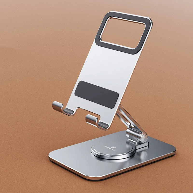 Folding aluminium alloy mobile phone stand in silver on a desktop showing rotary mechanism