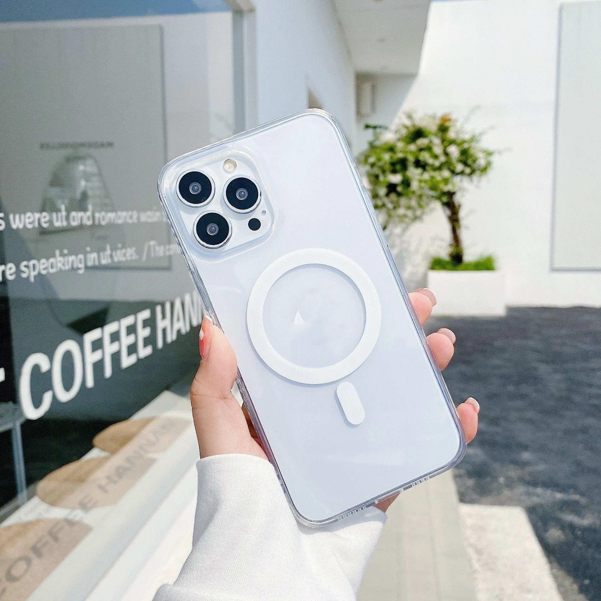 Transparent frosted magnetic back case for iPhone 14 Pro Max with visible camera cutout and shiny laser pattern