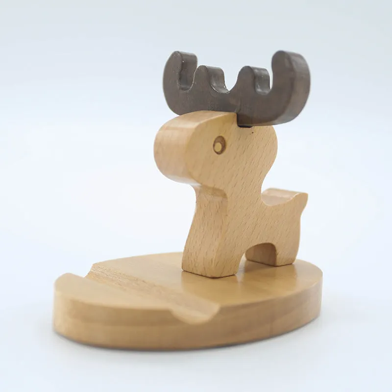 A decorative beech wood and resin mobile phone holder stand featuring themed designs like animals and zodiac signs.