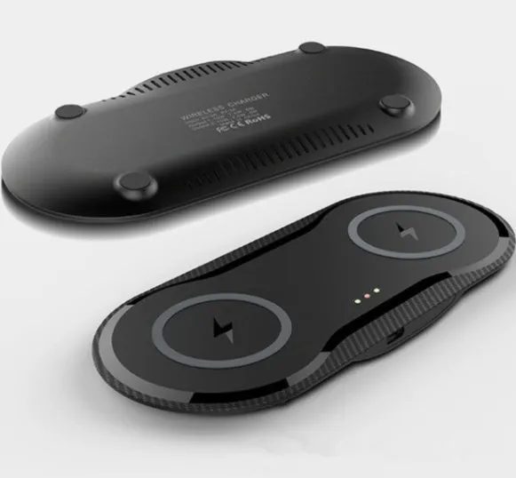 Black and white dual wireless charging pad showing two phone charging positions with Type-C cable