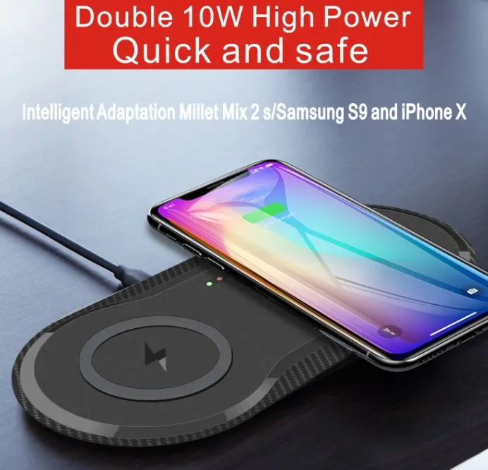 Black and white dual wireless charging pad showing two phone charging positions with Type-C cable