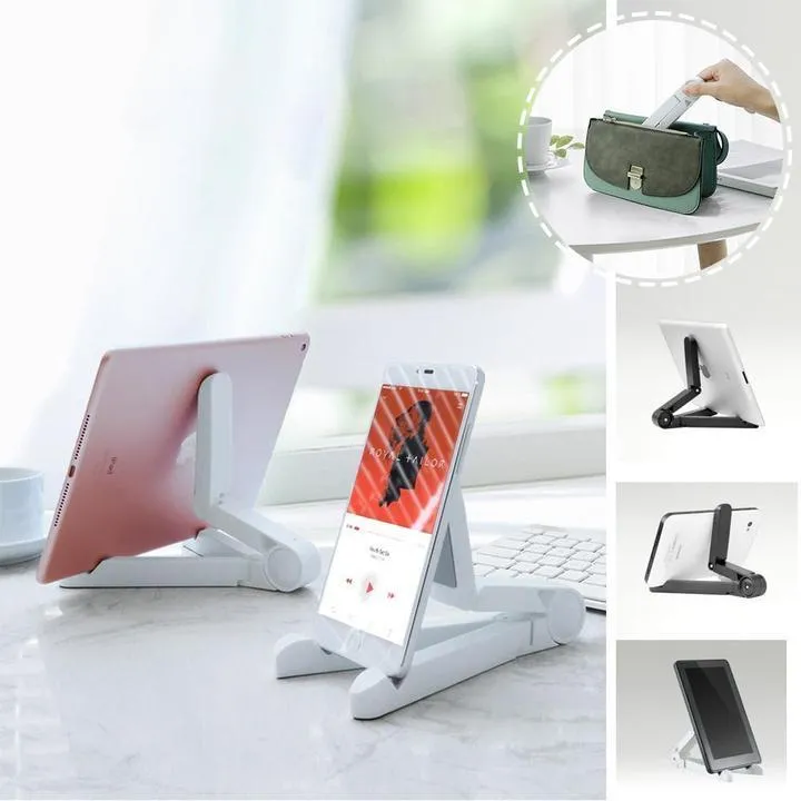 Black foldable tablet holder showing folded size next to tablet for scale