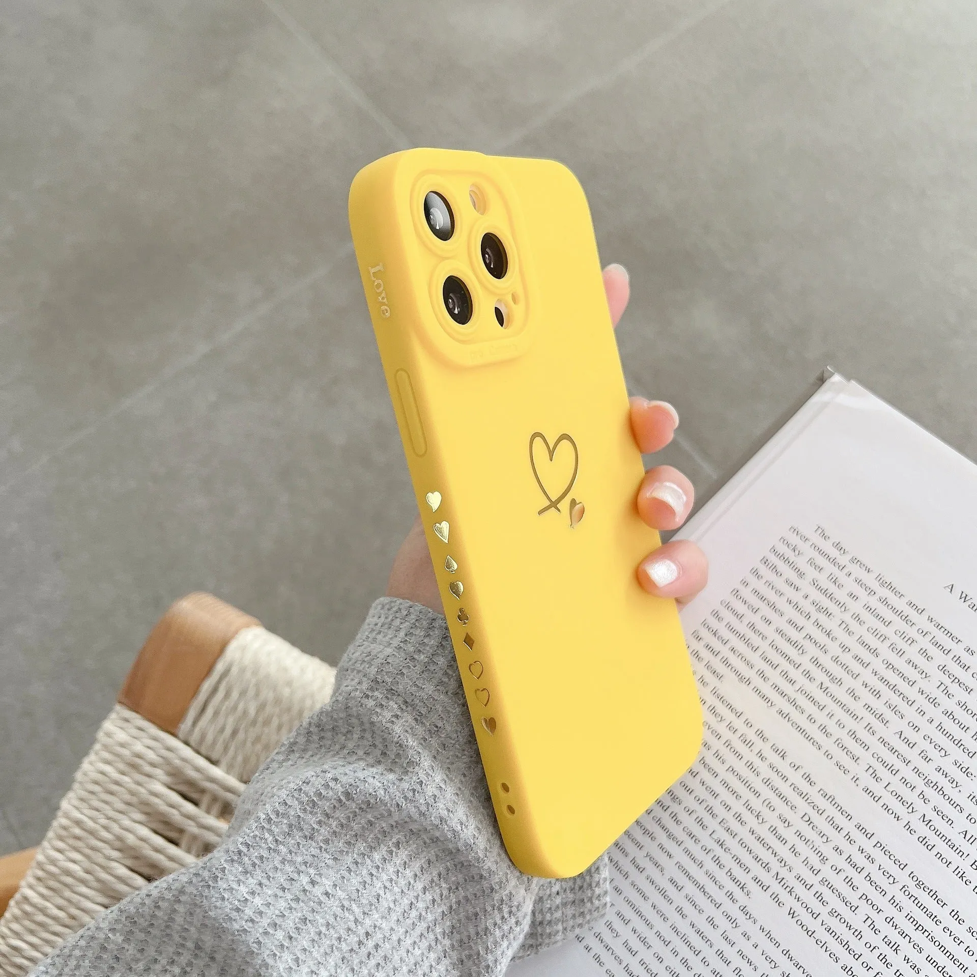 Soft love shockproof silicone phone case in beige for Apple iPhone 13 and 14 series with raised bumper edge