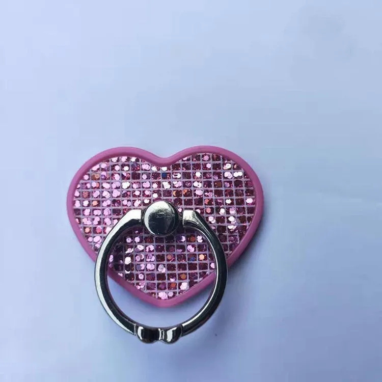 Universal cell phone ring stand with metal and plastic construction, available in five colours including black, gold, and pink