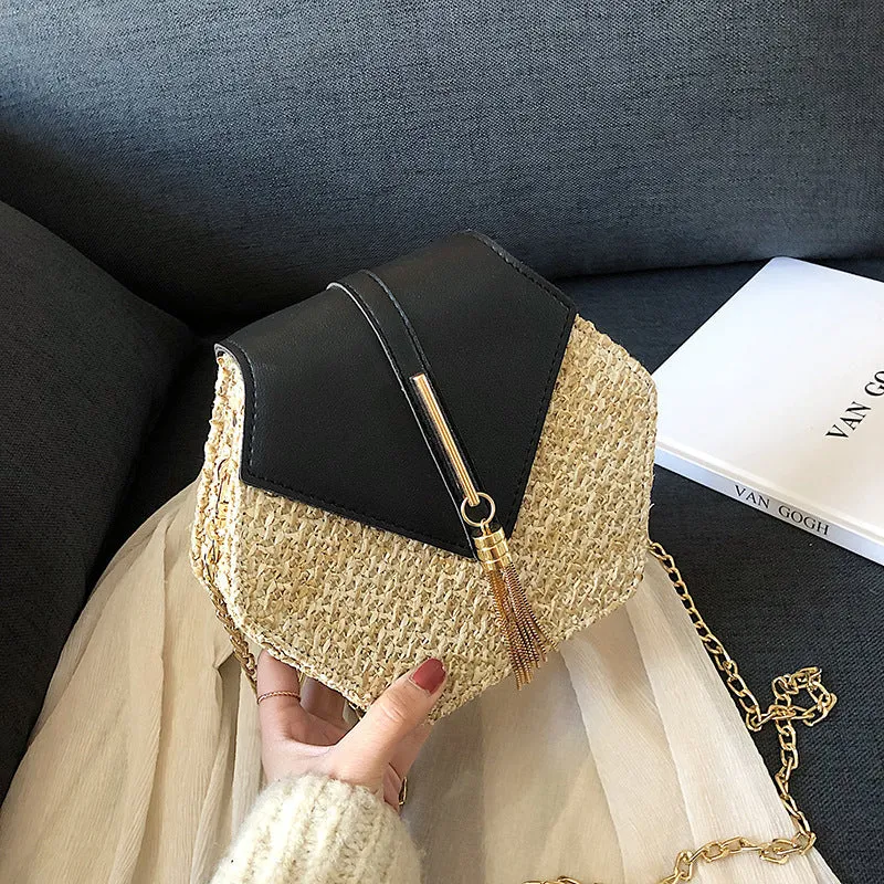 Women's woven straw shoulder bag with chain handle, lock closure, available in black brown green white