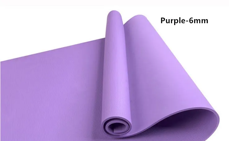 Red EVA fitness yoga mat rolled up next to its storage bag, showing textured surface.