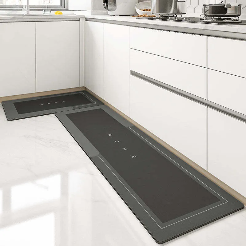 Machine-woven blended bathroom floor mat in blue, shown in an oval shape on a tiled floor.