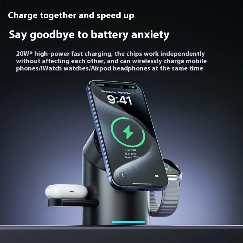 Three-in-one magnetic wireless charger stand in dark grey charging a phone, earphones, and Apple Watch