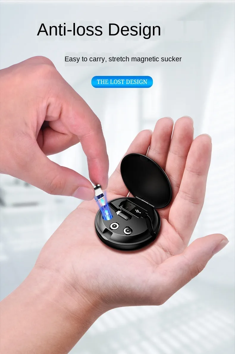 Magnetic Sucker 3-in-1 data cable in black with three connectors on a desk