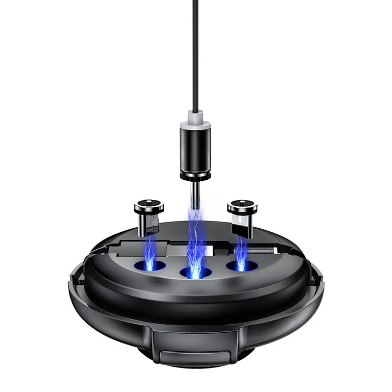 Magnetic Sucker 3-in-1 data cable in black with three connectors on a desk