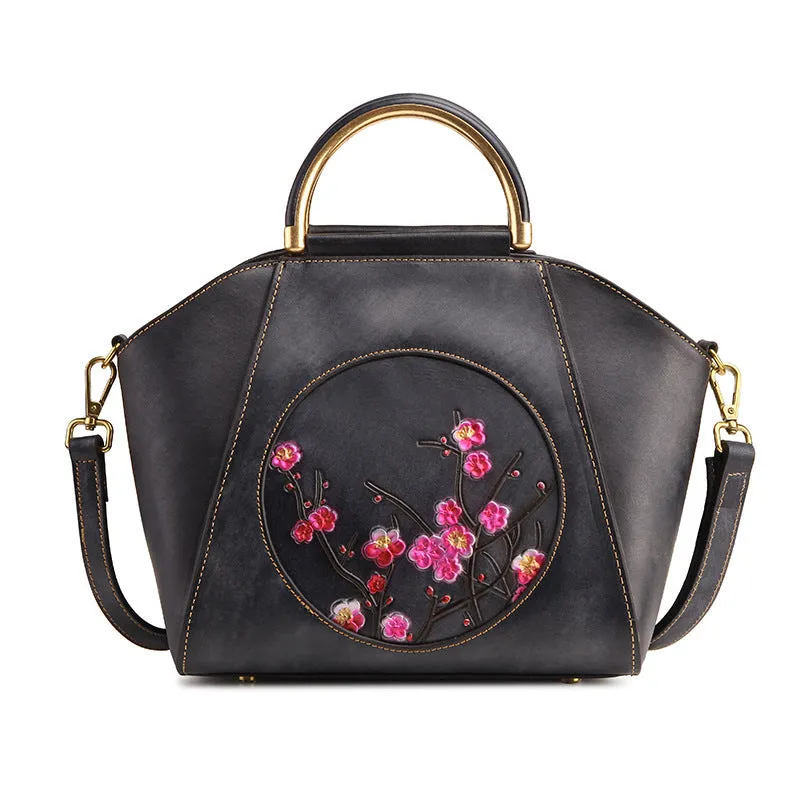Cowhide leather handbag in black with hand-rubbed colour finish and cover closure