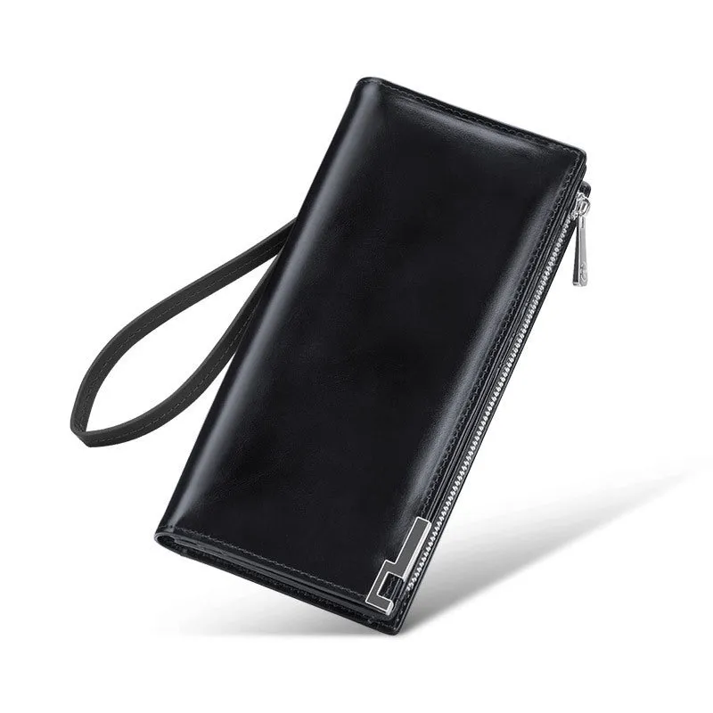 Brown solid colour cowhide leather wallet with contrast stitching laid open showing card slots and cash compartment