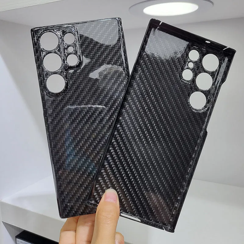 Forged carbon fibre phone case with gold foil finish for Samsung S25 Ultra, displayed on a white background