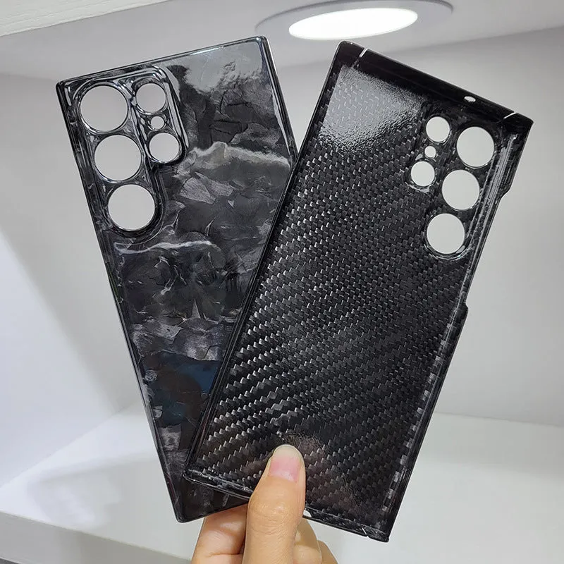Forged carbon fibre phone case with gold foil finish for Samsung S25 Ultra, displayed on a white background