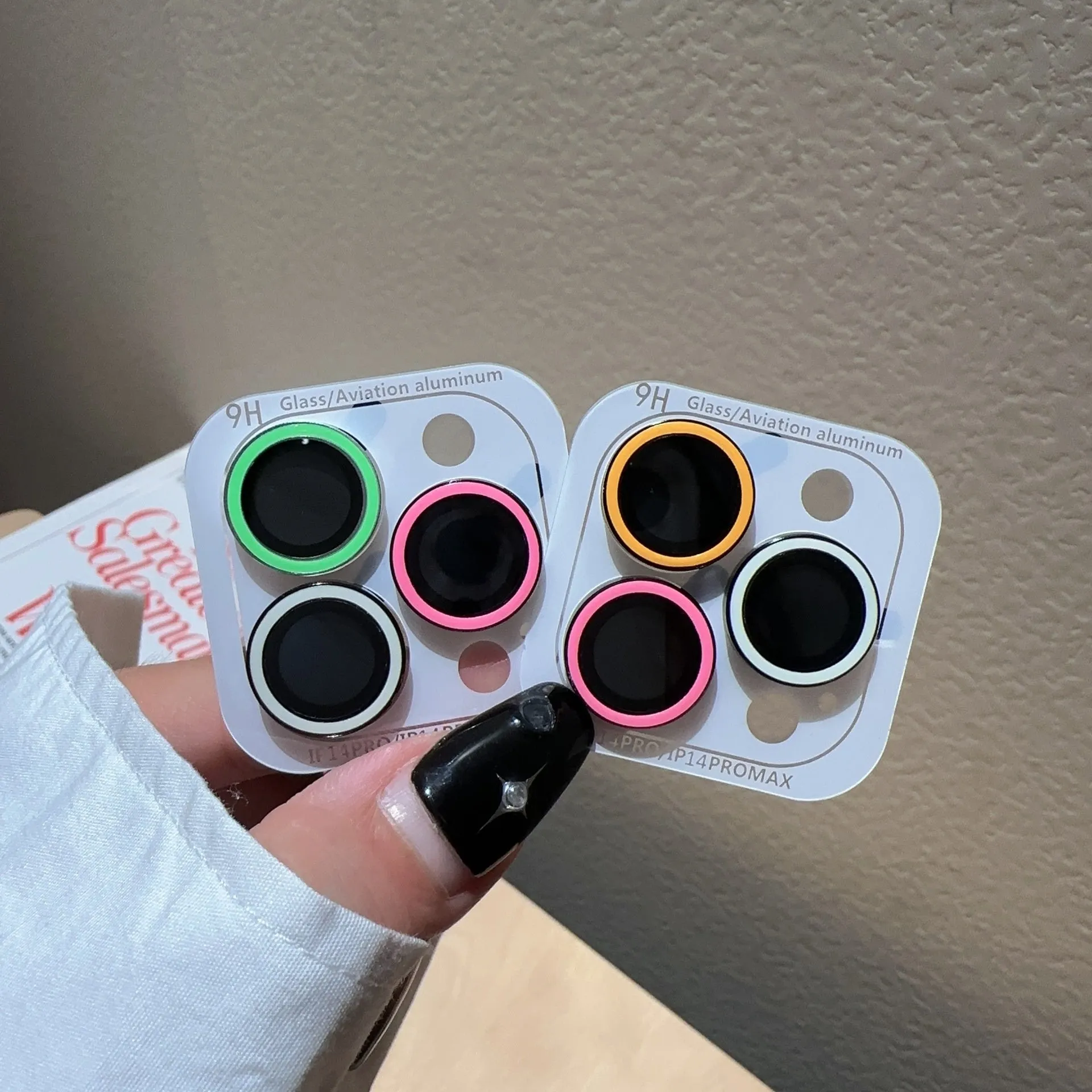 HD tempered glass lens protector for iPhone 14 Pro Max with three-hole cutout, available in multiple colours
