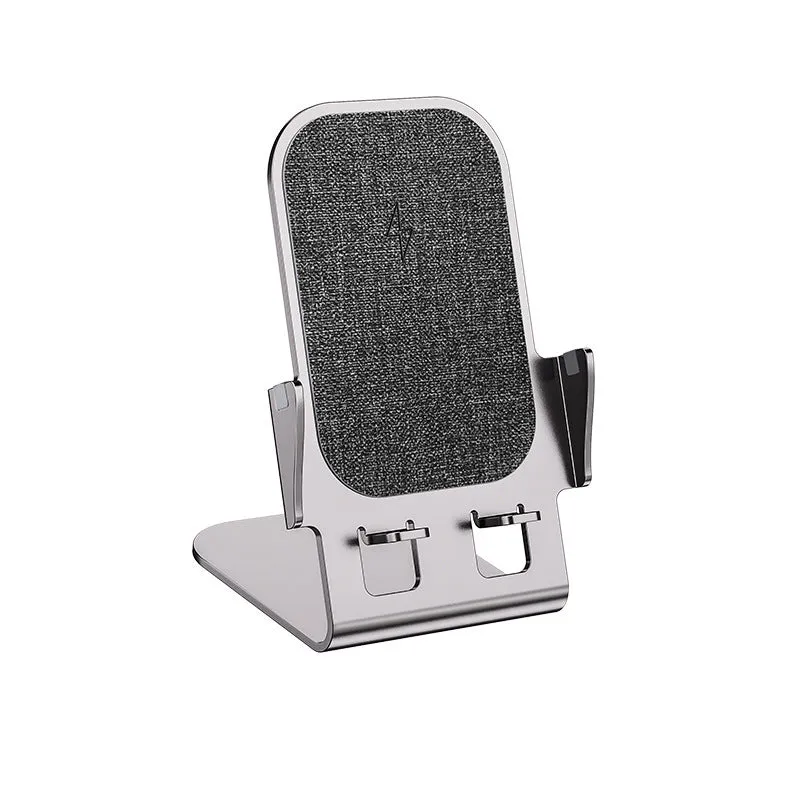 Metal desktop stand wireless charger in silver finish with phone charging on desk