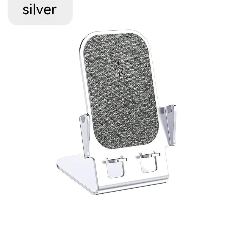 Metal desktop stand wireless charger in silver finish with phone charging on desk