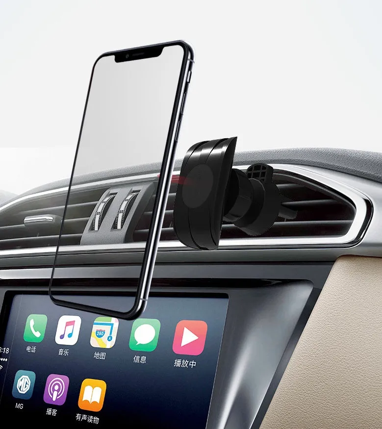 Matte black car phone holder clipped onto a car air vent, holding a smartphone.