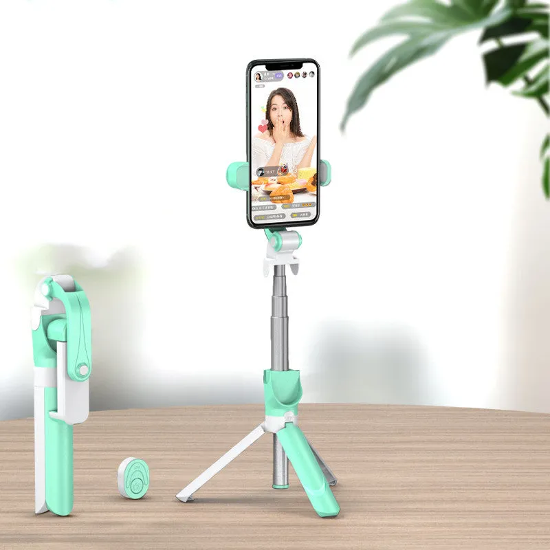 Selfie stick with aluminium alloy body and phone holder in tripod mode on a desk