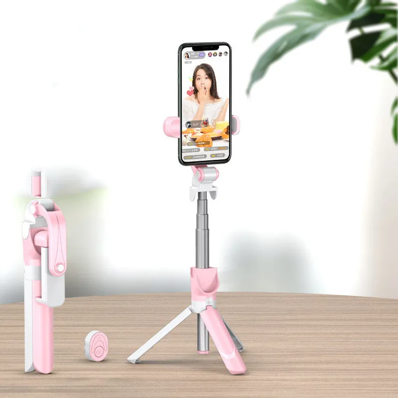 Selfie stick with aluminium alloy body and phone holder in tripod mode on a desk