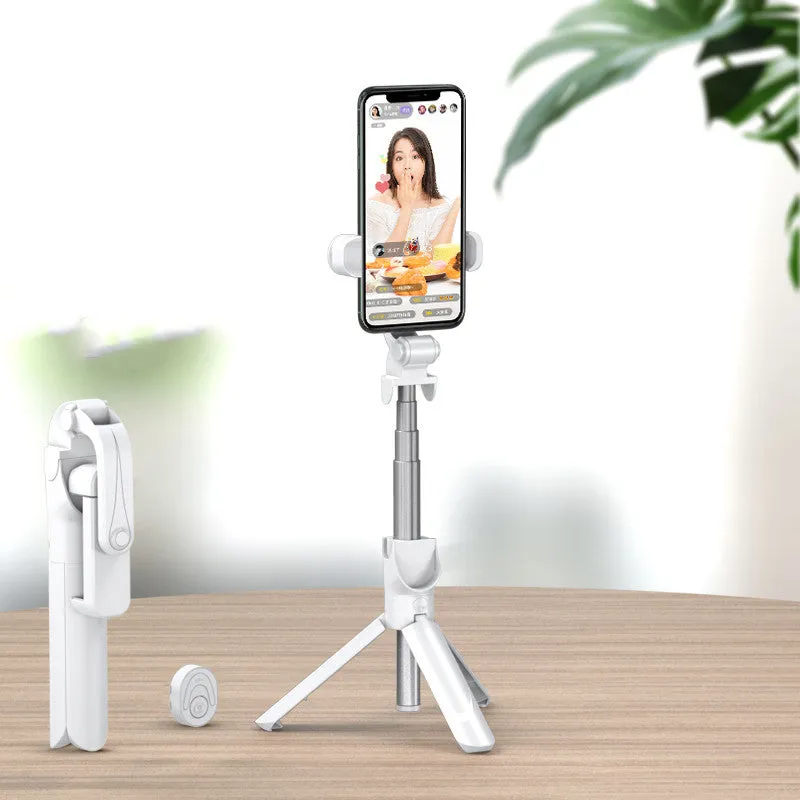 Selfie stick with aluminium alloy body and phone holder in tripod mode on a desk