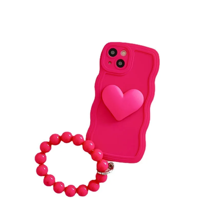 Silicone wavy edge phone case with love ball chain in Rose Red for iPhone 14 Pro Max