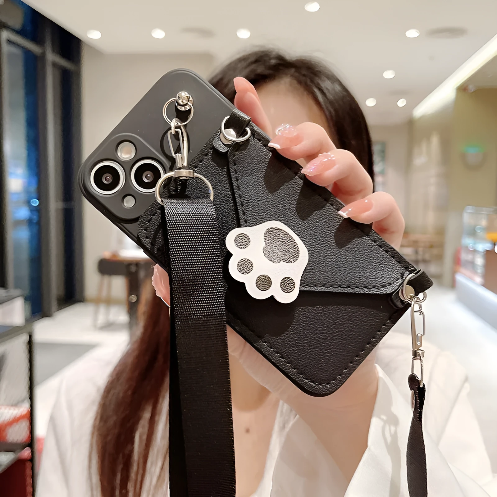 Cat's Paw TPU drop-proof crossbody phone case for iPhone, black colour, minimalist design