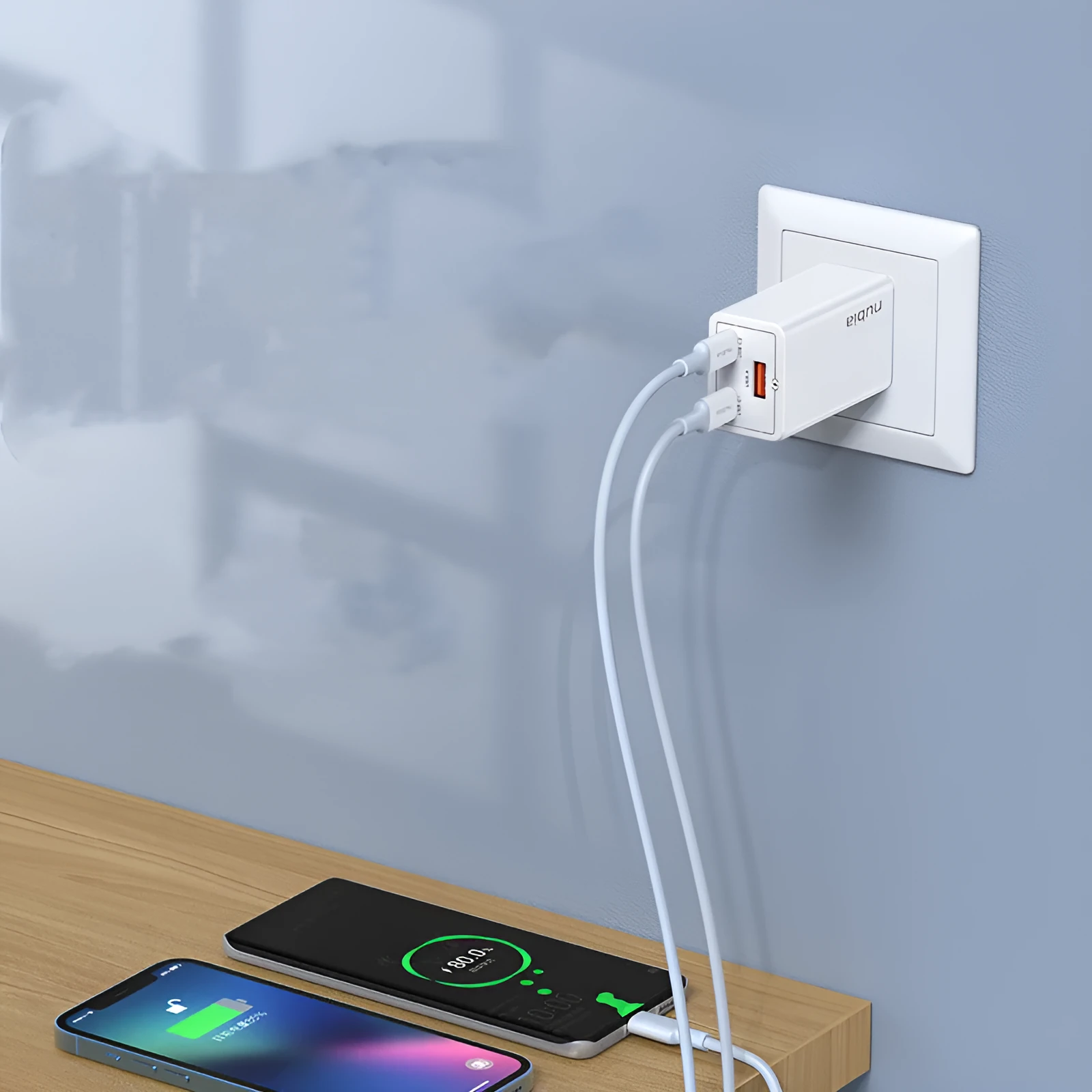65W gallium nitride multi-port charger in grey with two USB-C and one USB-A ports