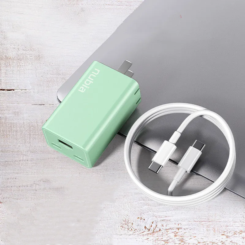 65W gallium nitride multi-port charger in grey with two USB-C and one USB-A ports