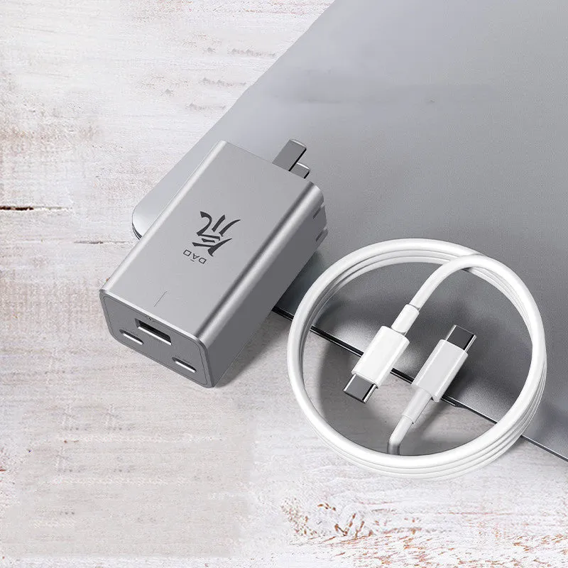 65W gallium nitride multi-port charger in grey with two USB-C and one USB-A ports