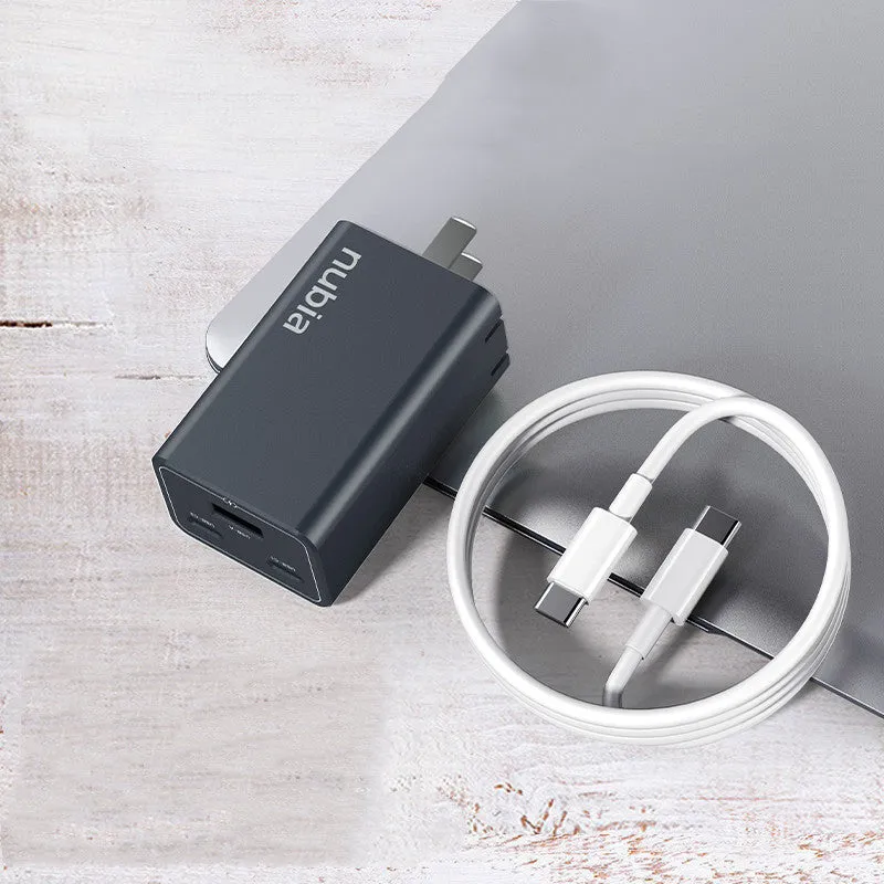 65W gallium nitride multi-port charger in grey with two USB-C and one USB-A ports